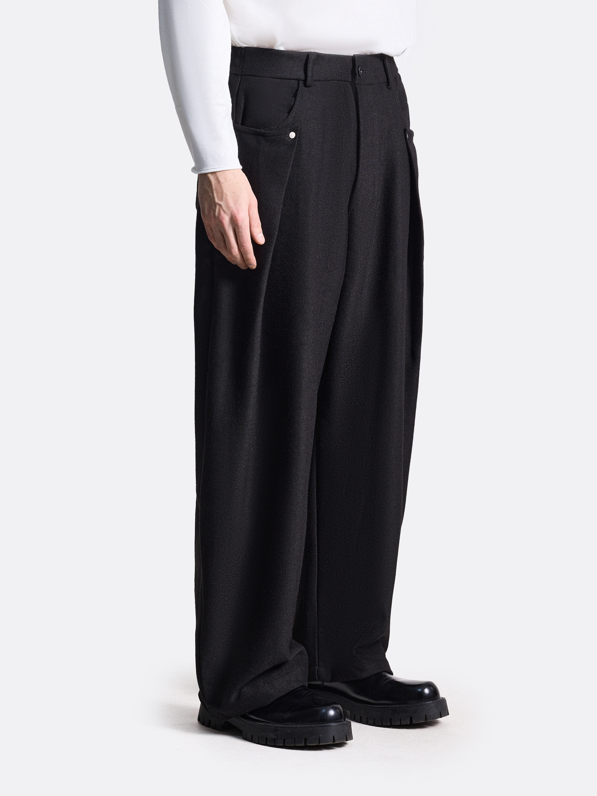 ​Брюки с защипами