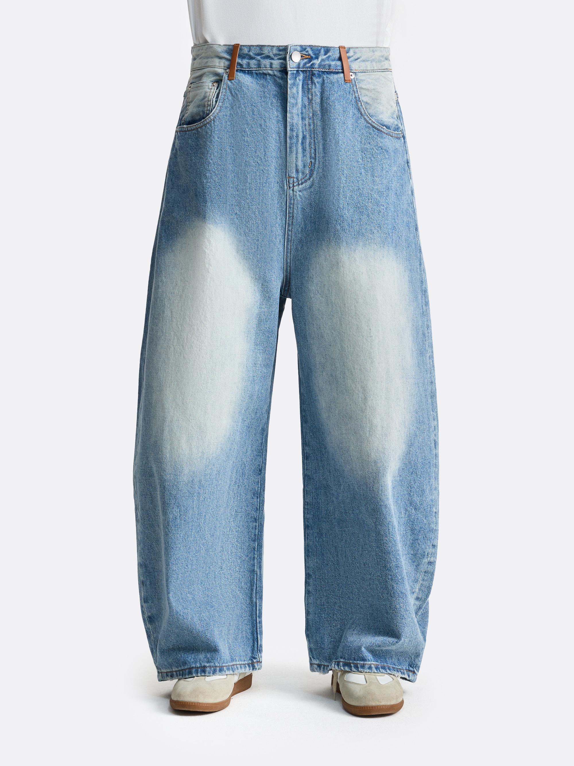 Джинсы с потертостями